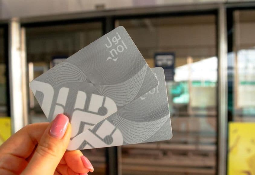 Dubai metro card, Nol cards in a woman's hand.