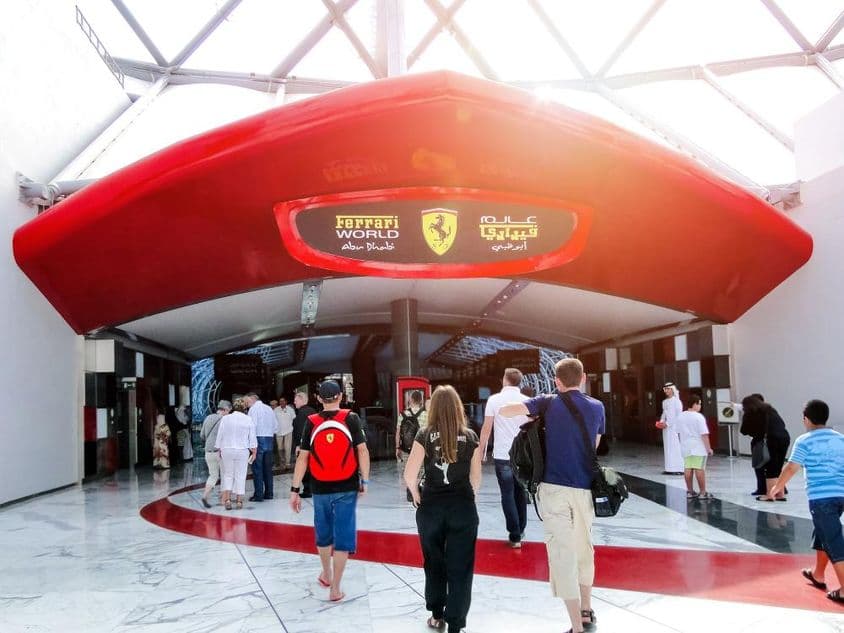 Ferrari World Esports Arena entrance in Abu Dhabi, people entering through the door.