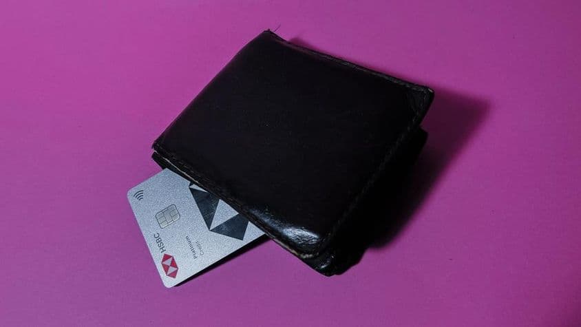 HSBC credit card in a worn black wallet.