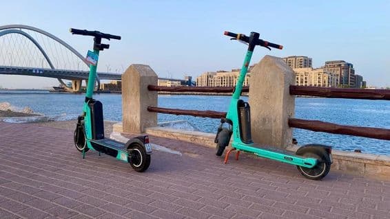 Dubai electric scooter near the ocean.