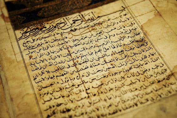 Old Arabic script in a book.