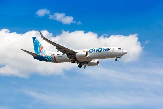 A flydubai aircraft flying in the sky.