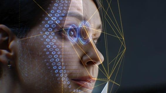 A female looking into a facial recognition system.