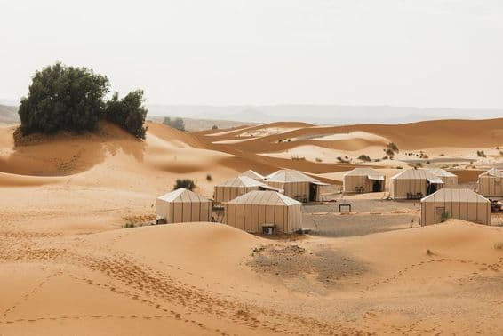 Dubai winter camping, buildings in the desert.