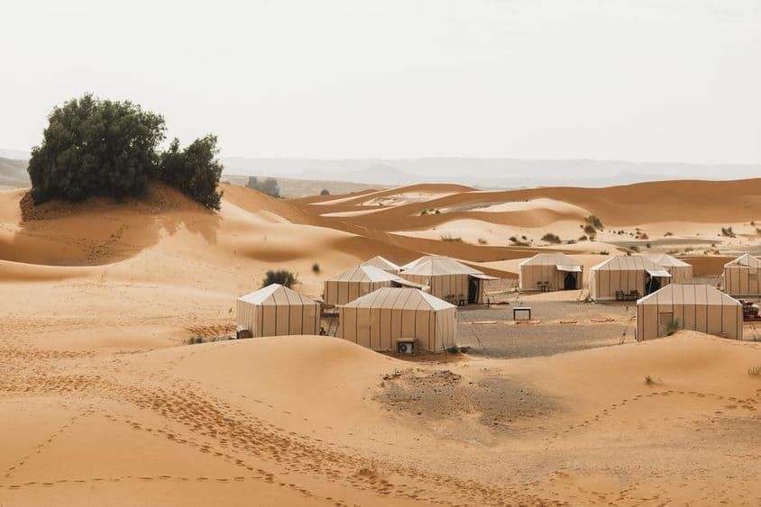 Dubai winter camping, buildings in the desert.