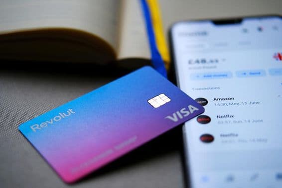 Revolut Visa card displayed on a phone screen.
