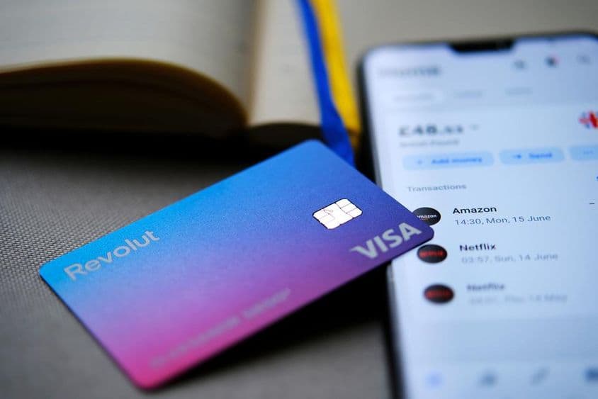 Revolut Visa card displayed on a phone screen.