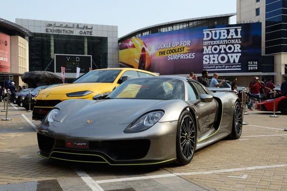 Porsche in the foreground next to a Lambo.