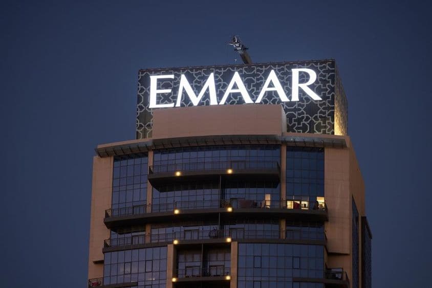 EMAAR logo visible on the top of a skyscraper.