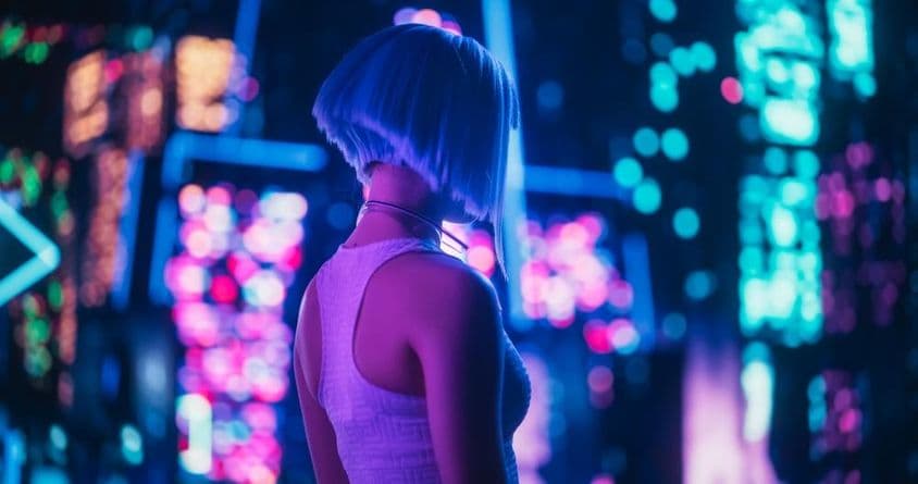 A woman heading to an Anime festival, with blue hair and blurred flashing lights in the background.