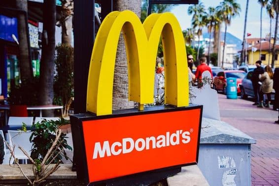 McDonald's sign visible with street view in the background.