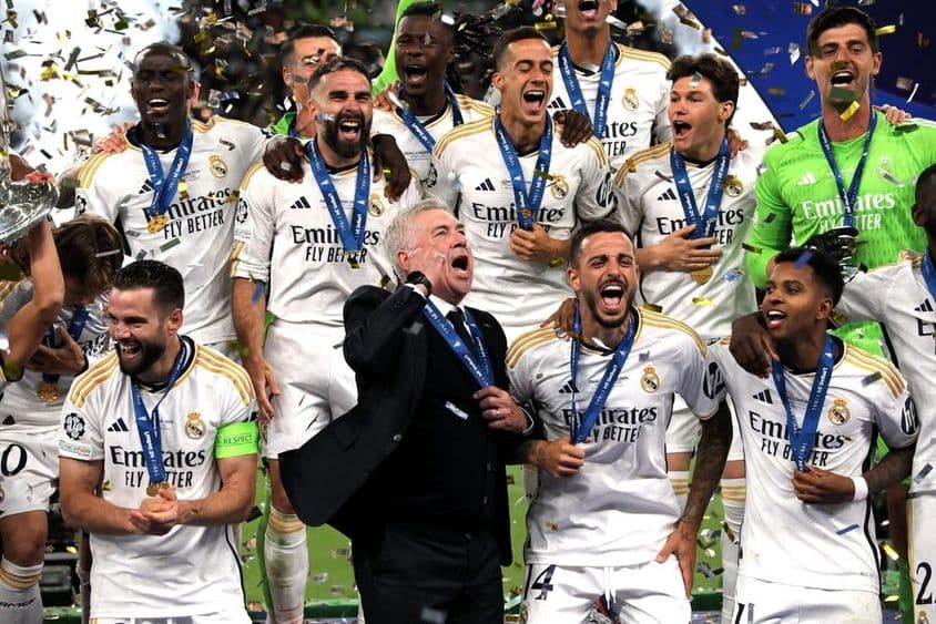 Real Madrid celebrating after a victory match.