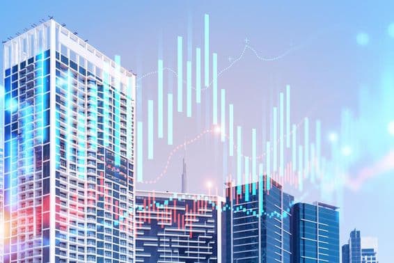 Buildings with the Burj Khalifa behind and charts in front.