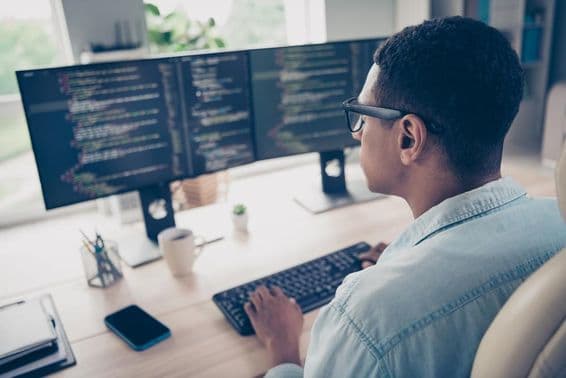 Student learning coding on a computer.