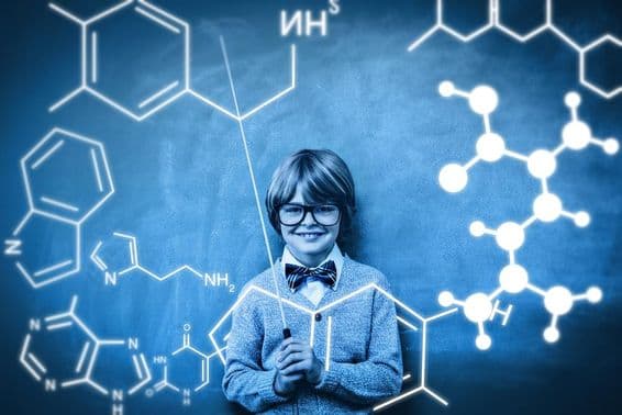 A student is shown with a projection of chemical atom bonding.