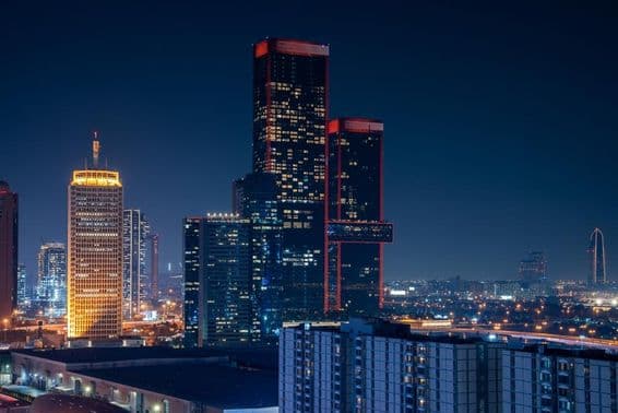 Dubai Business Bay with skyscrapers in the background.