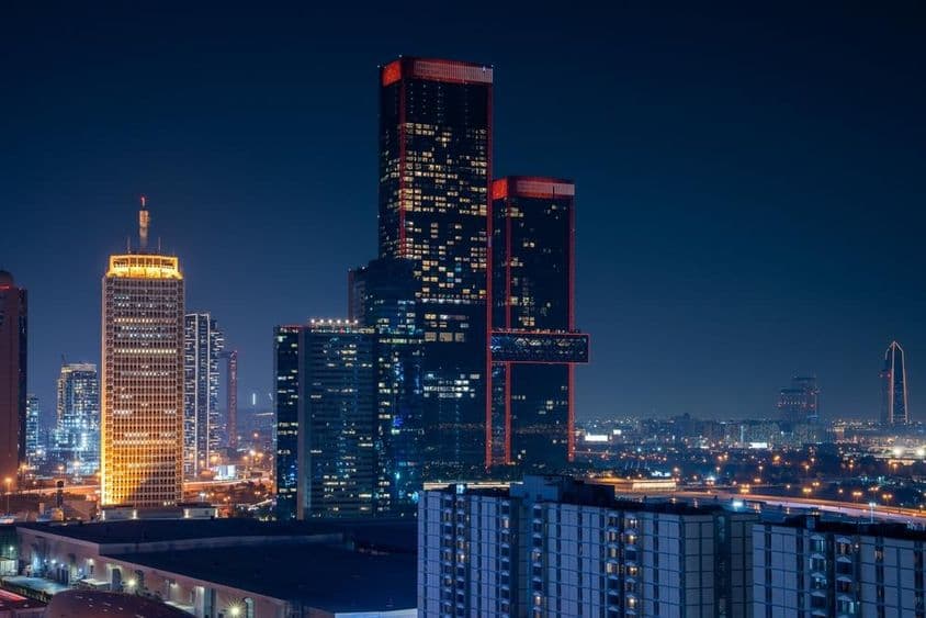 Dubai Business Bay with skyscrapers in the background.