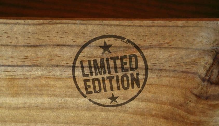 Limited edition written on a wooden surface, with stars around it.