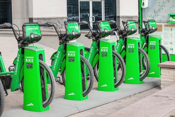 Careem bikes placed together in a docking station.