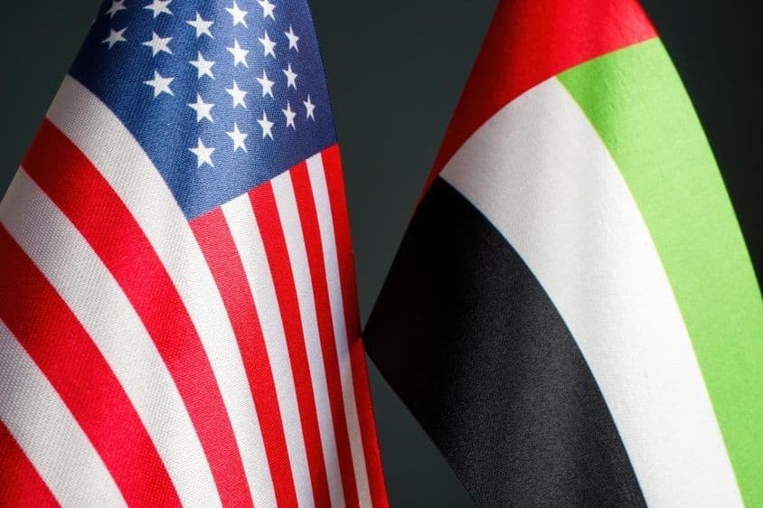 USA and UAE flags.