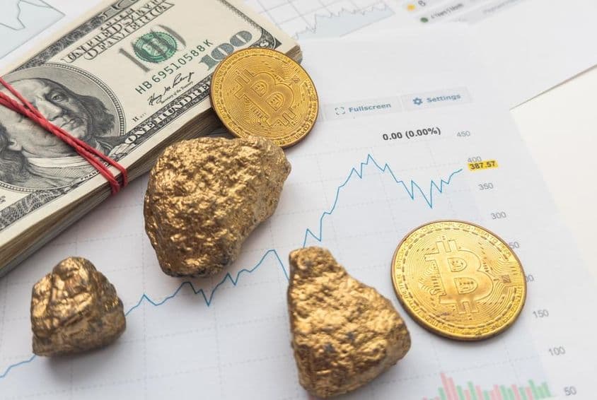 Gold, Bitcoin coin, dollar bundle.