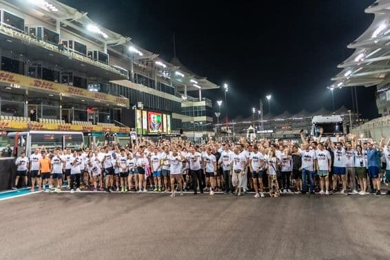 People waiting at the start line for the race to begin.