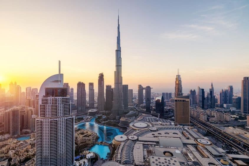 Dubai skyline with skyscrapers in the background.