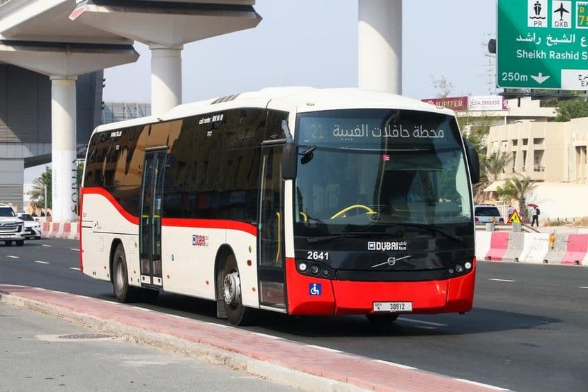 Dubai bus traveling on the road.
