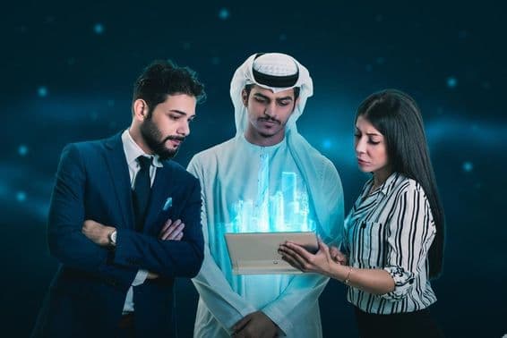 Two men and a woman examining a hologram.