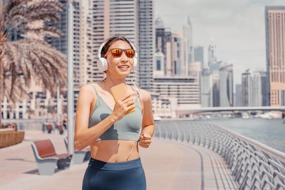 Female runner in Dubai Marina.