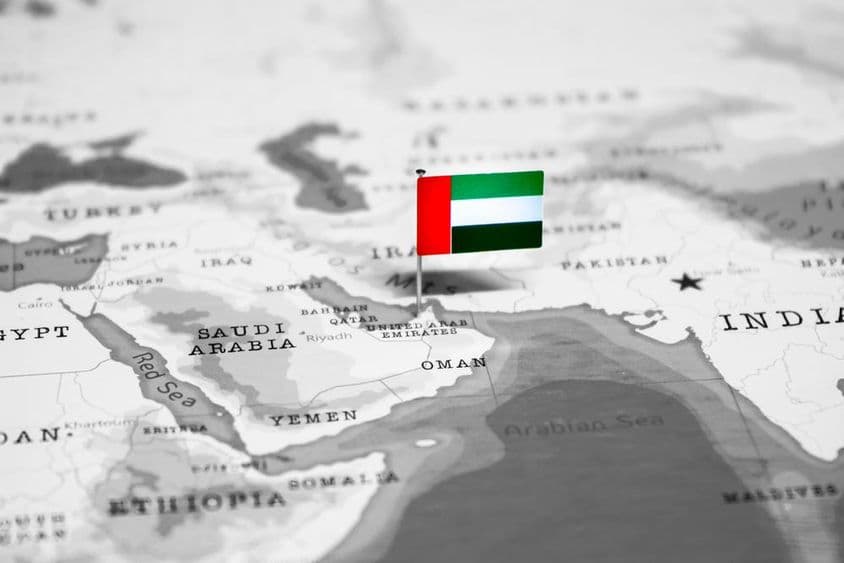 Dubai on the map with a UAE flag.