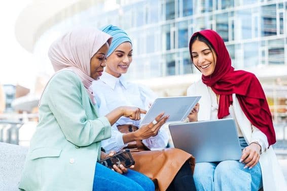 Dubai students studying in the school yard.