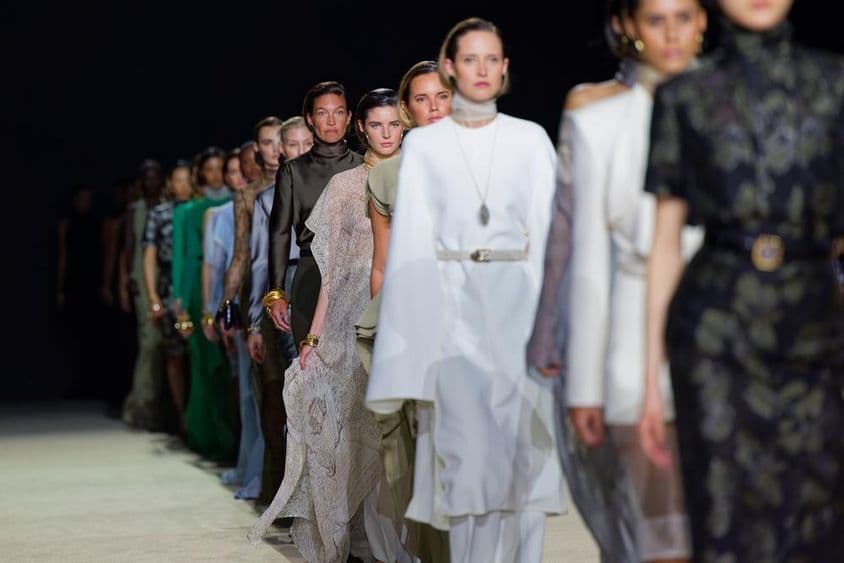 Models walking on the runway.