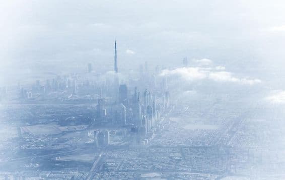 Dubai skyline, hazy weather.