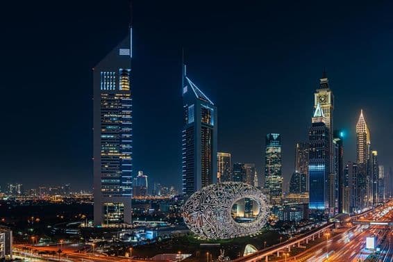 Dubai at night, with the Museum of the Future.