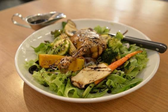 Tender duck on a salad plate.
