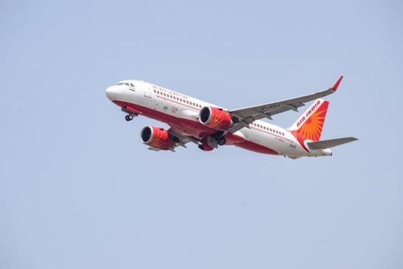 Air India Airbus A320 taking off from Indira Gandhi International Airport in Delhi.
