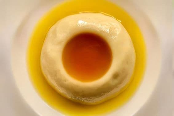 Aseeda, a well-known sweet dish, traditionally cooked at gatherings, especially during childbirth celebrations or family events during holidays.