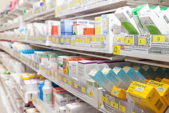 Pharmacy shelves with various products.