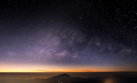 High mountains, night, Milky Way, and stars on the night sky are beautiful.