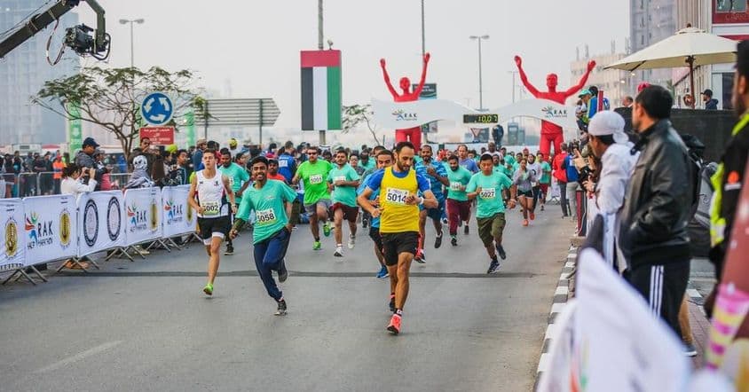 Runners and marathon winners on the street course.