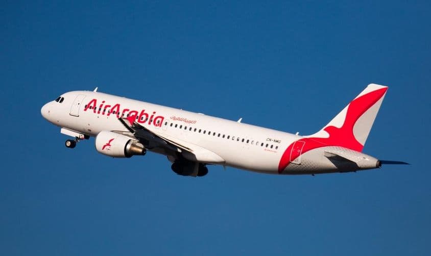 Airbus A320 with registration CN-NMG, Air Arabia Airlines, taking off from the runway.