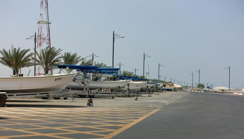 Kalba Sharjah, UAE view of fishing boats lined along the coast.