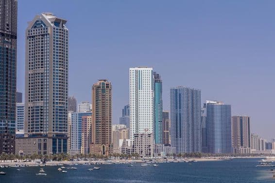 Sharjah skyscrapers line the waterfront.