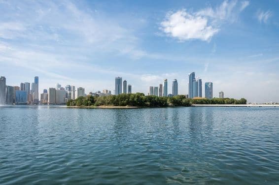 Panoramic view of Sharjah Emirate's center, overlooking skyscrapers.