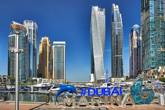 Skyscrapers and walkways in Dubai harbor.