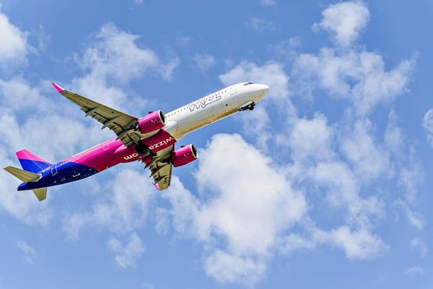 Wizz Air airline Airbus A321 airplane taking off.