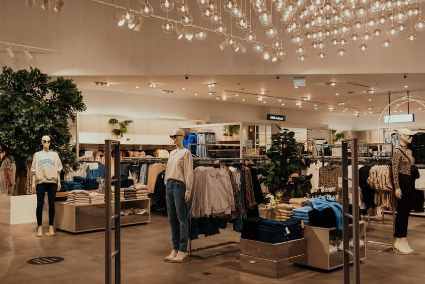 Dubai retail store with many clothes and mannequins.