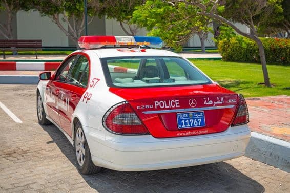 Police car on a street in Abu Dhabi in 2014, the capital of the United Arab Emirates.