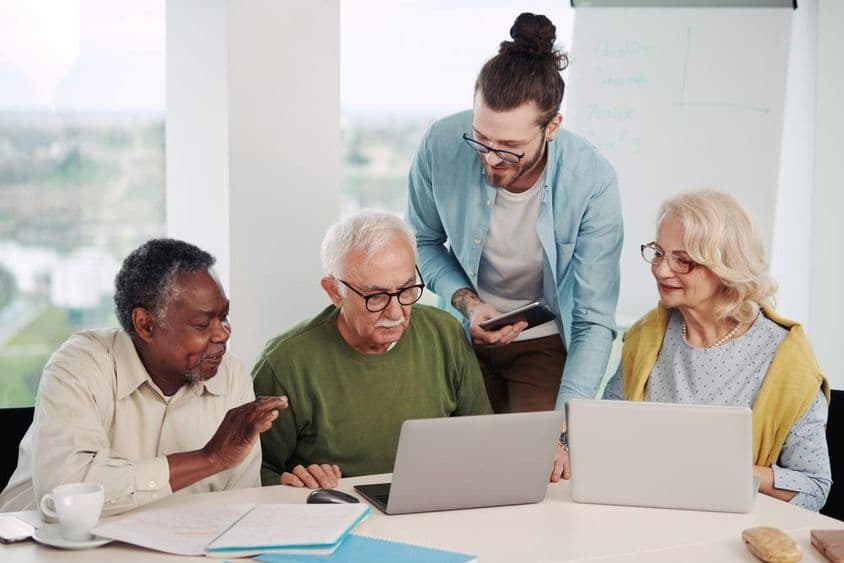Educator explaining the use of social media in the modern world.